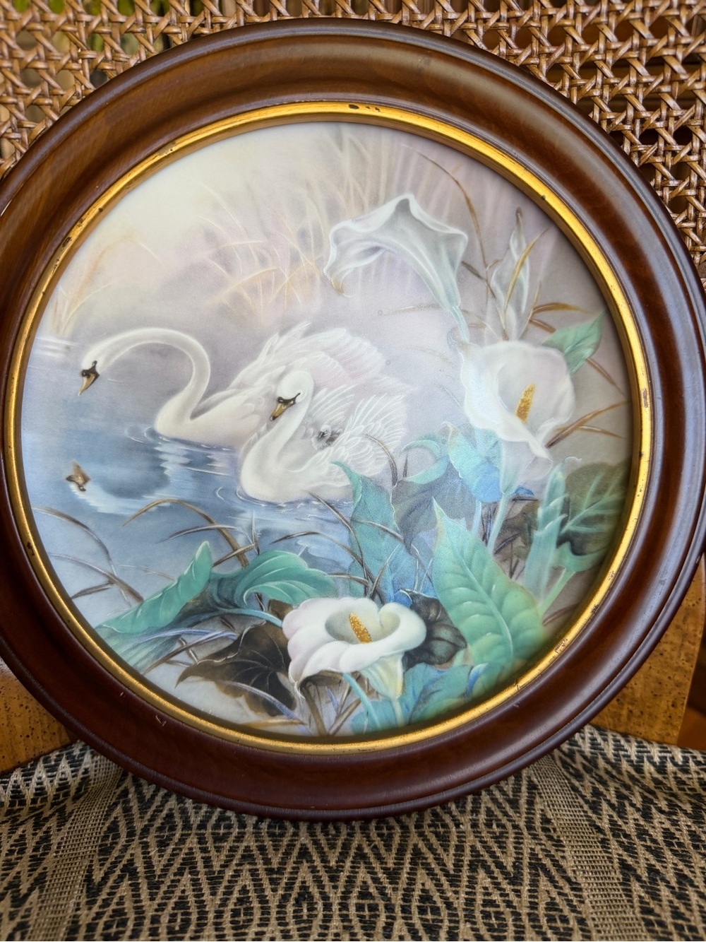 Round Wall Art Print with Swans and Calla Lilies in Brown Frame
